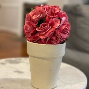 Faux flowers in pot